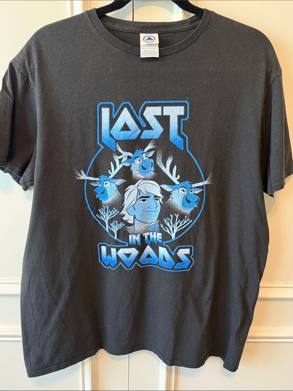 Delta Black Graphic Tee with Blue 'Lost in the Woods' Print
